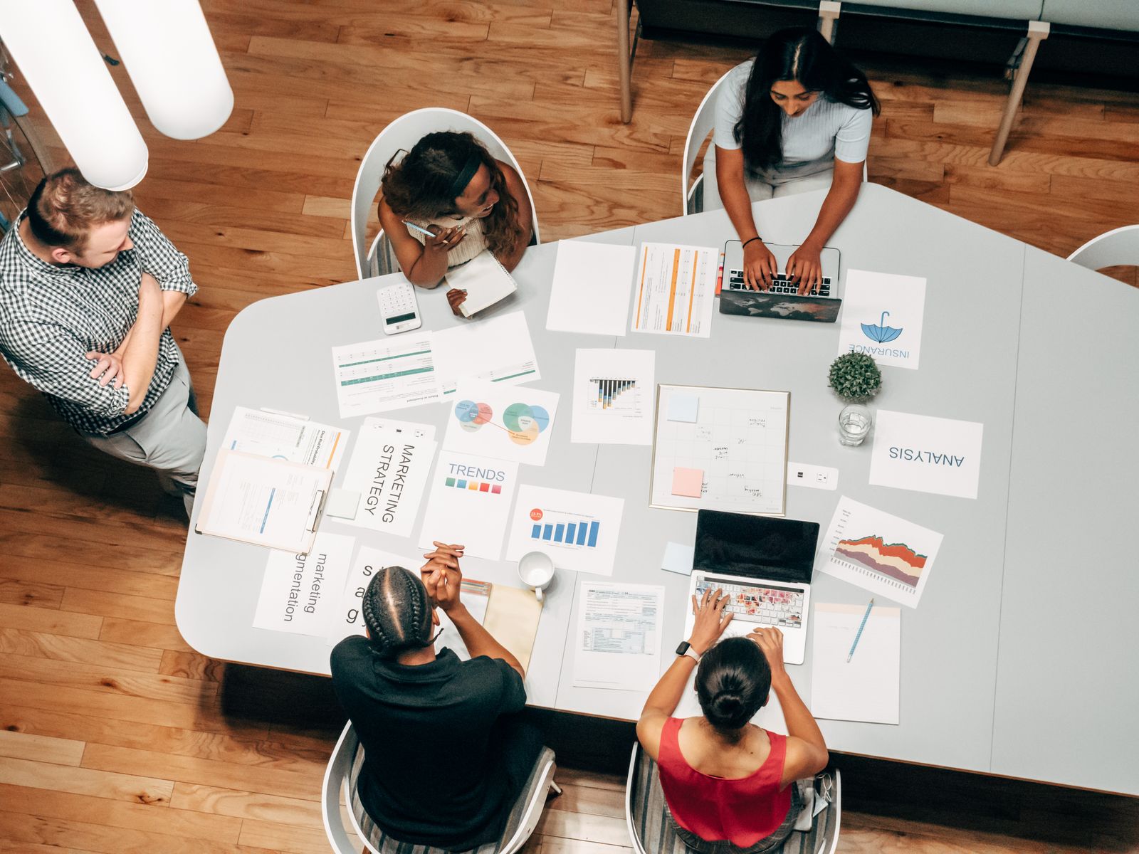 Content production desk with campaign creative assets